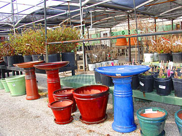 Our new pottery line includes pots with saucers and matching birdbaths.