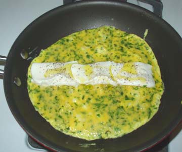 I used fresh, soft mozzarella, but any white cheese would probably taste good with these herbs and the tomato and garlic.