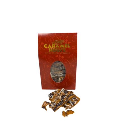 English Toffee is a caramel candy coated in dark and white chocolate, topped with pecans. A crunchy, rich treat perfect for gifts, holidays, or personal indulgence.