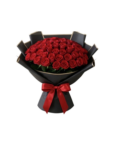 A large bouquet of 50 or 100 premium red roses wrapped in black gift paper and tied with a red bow, creating a bold and luxurious presentation.