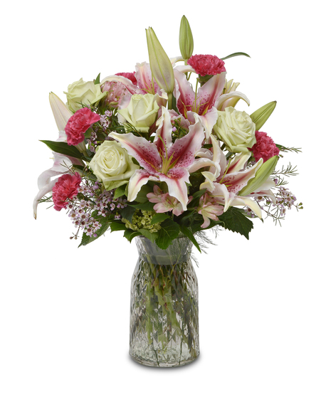 Beautiful, fragrant bouquet of stargazer lilies, jade roses and other favorites in a glass vase