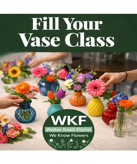 People arranging colorful flowers in various glass vases during a hands-on floral design class at a flower studio with bright blooms and tools on tables.