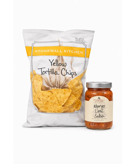 Sip, Dip & Crunch gift set with tortilla chips, mango lime salsa, margarita mixer, and cocktail shaker arranged in a modern gift box on a white background