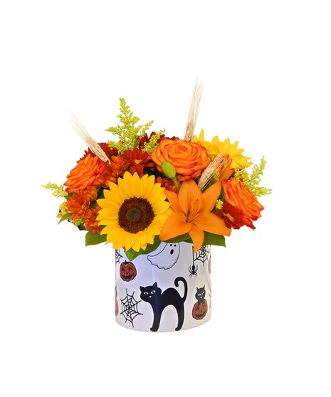 Frightfully Fresh Halloween flower arrangement with sunflowers, lilies, and roses in a festive Halloween pot with ghosts, pumpkins, and black cats