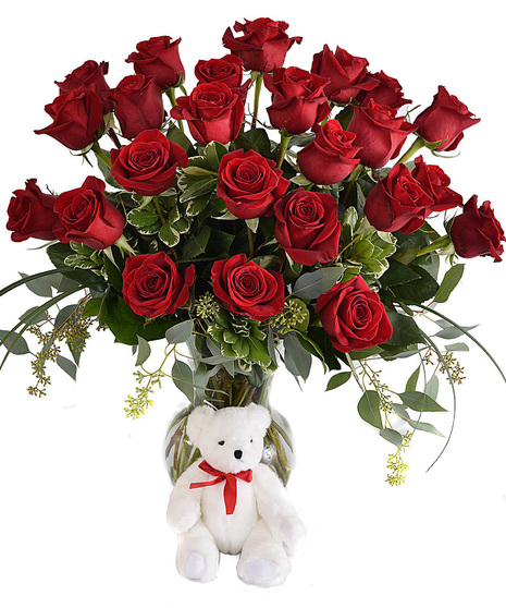 beautiful roses with cute plush baby bear