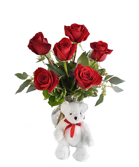 beautiful roses with cute plush baby bear