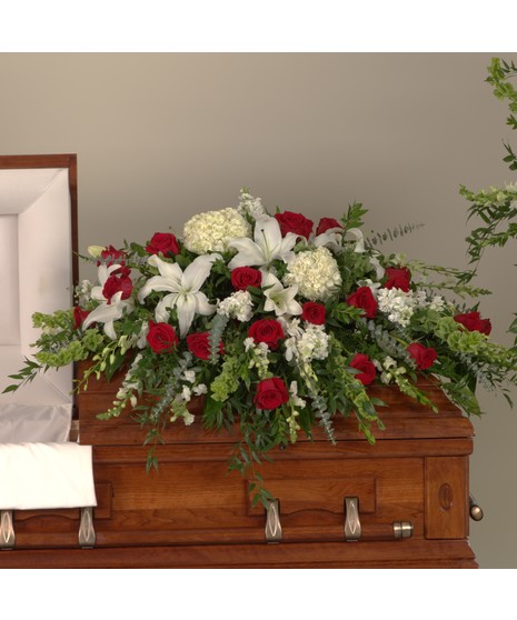 Shades of Red and White Casket Spray