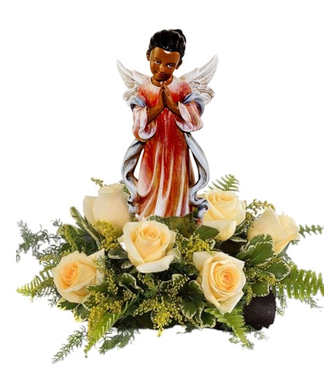 A serene floral arrangement featuring an angel figure surrounded by roses and soft greens, symbolizing remembrance and peace.
